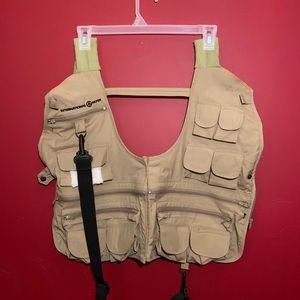 Upcycled utility vest and book bag.